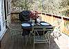 Home has one level.  Deck is off the dining/living area with french doors.