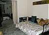 Full size daybed with attached bath. on the lower level.