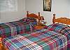 Nicely furnished with twin beds.