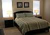 This room has a king size bed with a 27