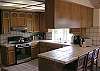 Clean and functional with a good sized breakfast bar.