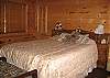 This room has a queen size bed.