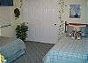 This brite and cheery room has 2 twin beds.