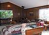 Located on the upper level, is open to the dining area and kitchen.