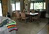 Seats 6 comfortably and is open to the kitchen and living room.  Located on the main level.