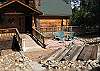Closer view of the house with small patio.