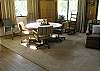 Game table is open to the living room/dining area.  Located on the main level.