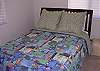 Located on the upper level and has a full size bed.