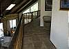 This area leads to the 2 upstairs bedrooms overlooking the main living area.