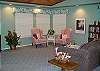Open to the dining area and kitchern with a modern TV
