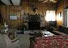 Located on the main level and is open to the kitchen and dining area.