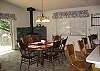 Has sliding glass door that leads out onto deck with BBQ