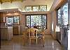 Dining for 6.  Open to the kitchen and living room.  Easy access to the back deck.