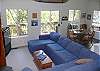 Nice open area located next to the kitchen.  Slider opens onto the deck.