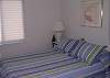 Located on the upper level and has a queen size bed.
