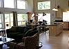 Nicely appointed room with soaring ceilings and lots of windows.