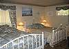 This is the master bedroom with attached bath and 2 queen beds.