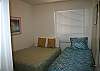 This main floor bedroom features a twin and full size bed. Shared Bathroom is just across the hall.