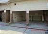 Parking is located in the back of the builidng with a gate that leads to the front. Parking is a covered carport area that is 7'9" wide-7' high- and 18' long. Best to back in and not suitabel for larger vehicles.