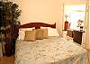 This bedroom sits just off of the living room. There is a bathroom with a shower and the bedroom has direct access to one of the balconies!
