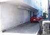 This parking space will fit two cars tandem. Large SUV's will even fit!