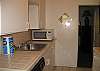 Kitchen is stocked with all that you need to enjoy a good family meal. Refrigerator, dishwasher, microwave and blender too!