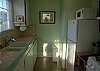 Kitchen is just off dining area with a window for great light! Offers a coffee maker, toaster, dishware, cook ware, microwave, gas stove-oven, and refridgerator!