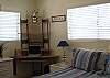 Calming seaside decor awaits you in the bedroom. This home features wireless internet too so bring your laptop!