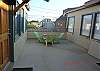 Shared upper patio area right outside your front door.