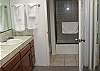Sink is seperate from toilet and shower.  This master bathroom is connected with the master bedroom.
