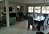 The upstairs is spacious with the living area, open kitchen and dining area.