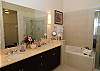 Features Double Sinks, Walk-In Shower and Jacuzzi Soaking Tub.