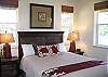 Luxury Queen Bedroom features desk area with FREE wifi and Flat Panel TV/DVD.