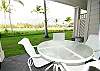 Ground Floor Lanai offers expanded lawn area with fairway and Mauna Kea views.