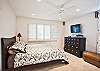 master bedroom with private bath at 42" flatscreen TV
