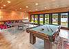 Pool table and ping pong table in the detached game house.