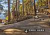 Parking area and cabin shown

**Parking is located a short walk from the cabin and down a narrow, forested path.