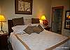 Mid floor- 3rd bedroom with king bed, large walk in closet and view of Monashee Mountains.