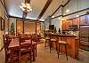 Stonegate 1 401 top floor lofted condo. Dining table seats 8 with 3 additional seating at breakfast bar.