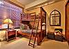 Stonegate 3402 2nd bedroom with twin over double bunk, plus a single pull-out futon ottoman.