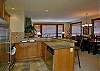 Heated slate florr, granite counter tops and stainless steel appliances.