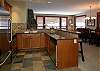 Heated slate floors, granite counter tops and stainless steel appliances