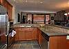 Heated slate floors, granite counter tops and stainless steel appliances.