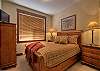Second bedroom with a queen bed.