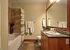 Master ensuite with shower over bath.