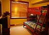 Single -over-double bunk bed.