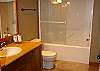 Mid floor- bathroom adjacent to 4th bedroom.