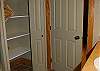 Ground floor-Storage cupboard in bathroom.