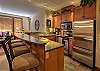 Heated slate floors, granite counter tops and stainless steel appliances
