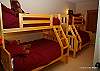 Mid floor- 5th bedroom, 2 sets of bunks with single over double bed.